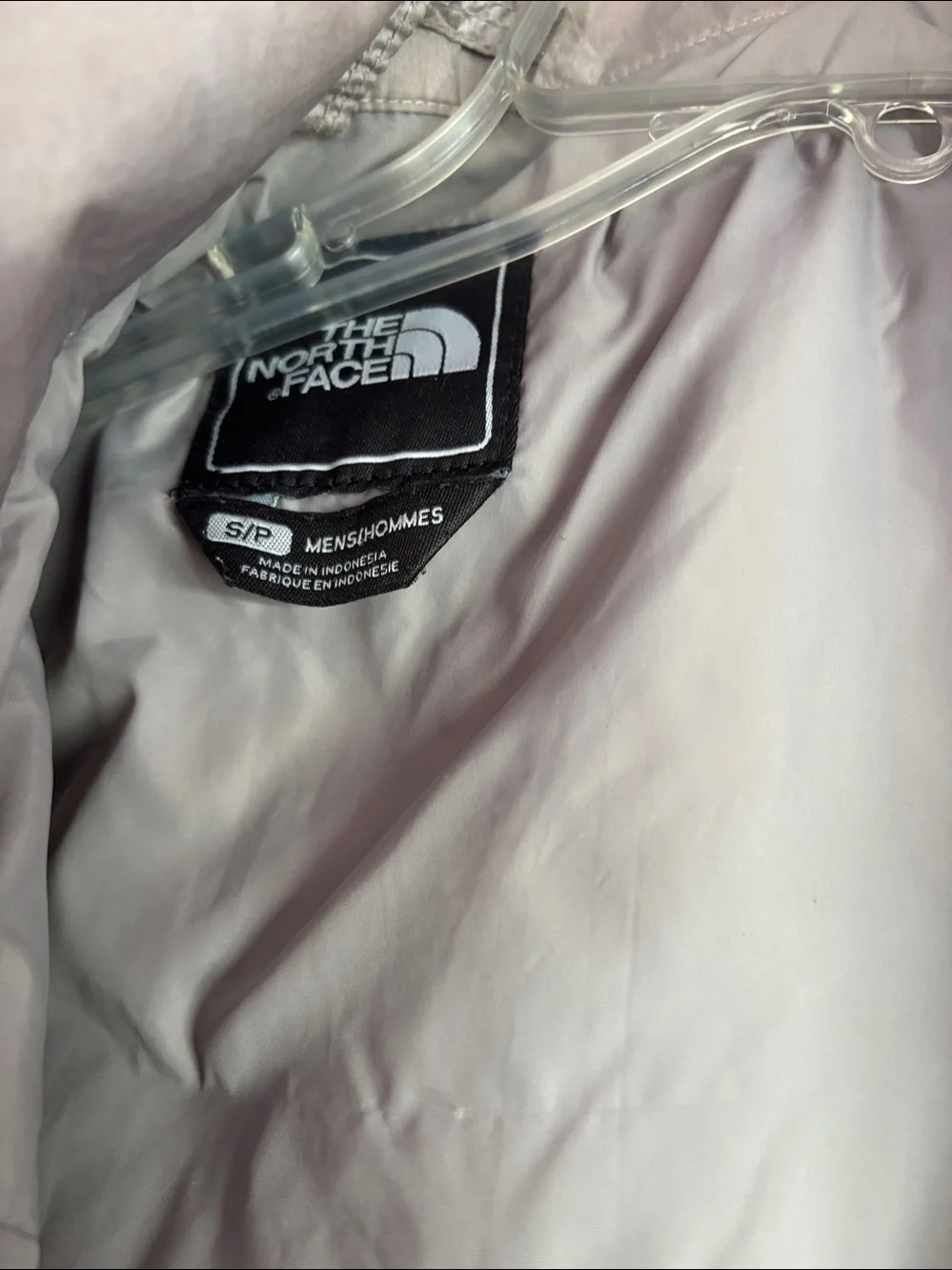 North face men’s black jacket.  Zip out liner.